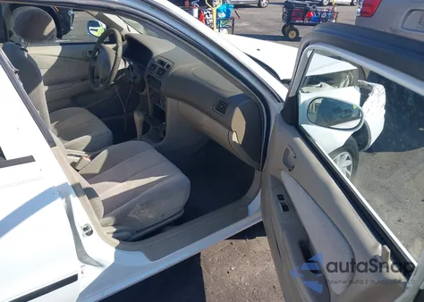 1999 Toyota Corolla Ce z USA, uszkodzony, nr VIN 1NXBR12E2XZ164958